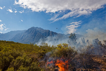 A wildfire raging across dry brush land near Worcester, Western Cape, South Africa.