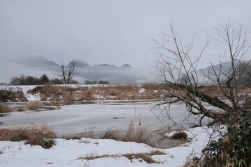 Pitt River Dike near the Grant Narrows Regional Park during a snowy winter season in Pitt Meadows,...