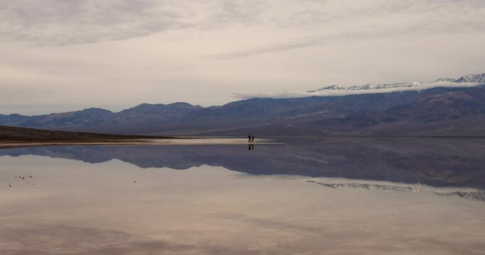 Death Valley Badwater Basin lowest in USA rain water. Largest national park in contiguous USA. 282 feet below sea level. Mojave Desert bordering Great Basin Desert. Ecological geology. 