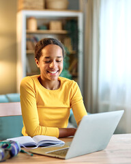 child laptop computer technology home girl education homework teenage learning kid internet childhood student black teen using online young happy