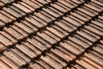 Fragment of vintage red clay roof tiles with with small hearts depicted,Jerusalem, Israel