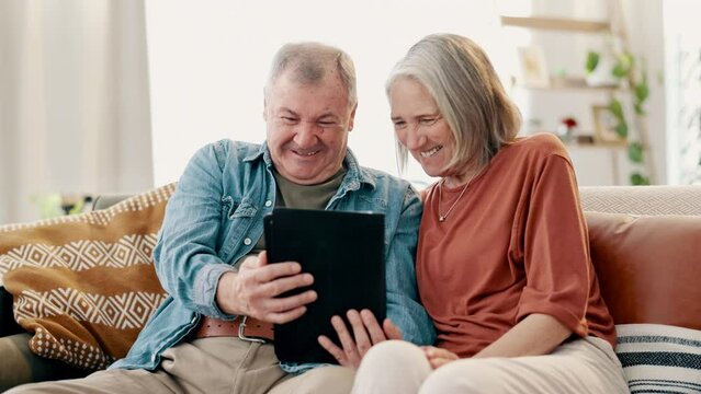 Senior couple, tablet and laughing for joke or meme on social media, app and streaming comedy at home. Happy elderly people, technology and web or blog for online comic, bonding and love for humor