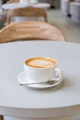 cup of cappuccino on the table