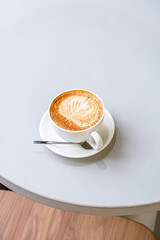 cup of cappuccino on the table