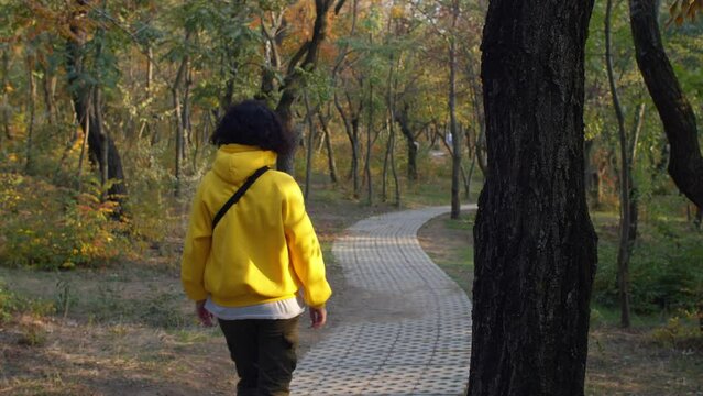Girl walking in the park