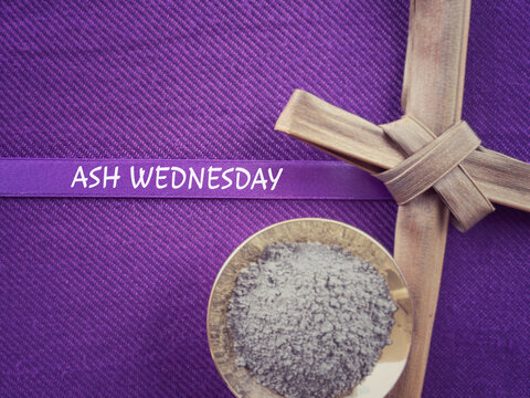 Christianity concept about Ash Wednesday, Good Friday, Lent Season and Holy Week. ASH WEDNESDAY written on a purple ribbon. With blurred style background.