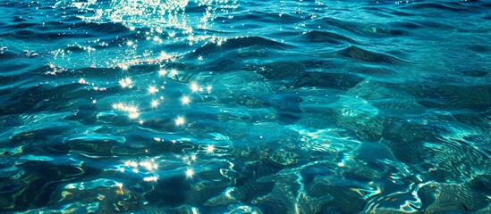 Sparkle on the Clear Blue Sea: Clear, Blue, Sea Water Shimmers on the Surface with Sparkle