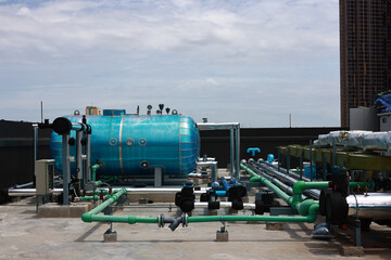Obraz premium High building Piping system for water supply and air conditioning system on rooftop, Mechanical system engineering