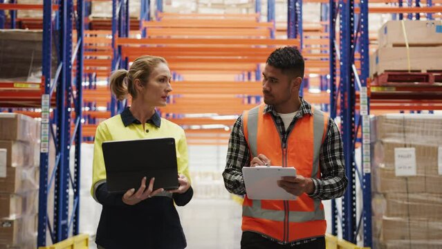 Employees talking in the warehouse