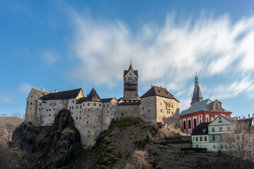 Fototapeta na wymiar Loket castle on a hill with a clock tower