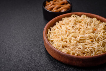 Delicious Asian cuisine dish with rice noodles, peppers, mushrooms and spices