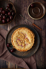 Cherry pie on dark brown background 