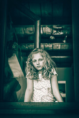 portrait of beautiful child, girl in window