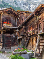 Zermatt, Switzerland - September 23, 2023: Historical wooden houses in the mountain village of Zermatt at the foot of the Matterhorn mountain