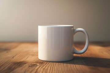 A white coffee mug sits on top of a wooden table. Perfect for illustrating morning routines and cozy coffee breaks