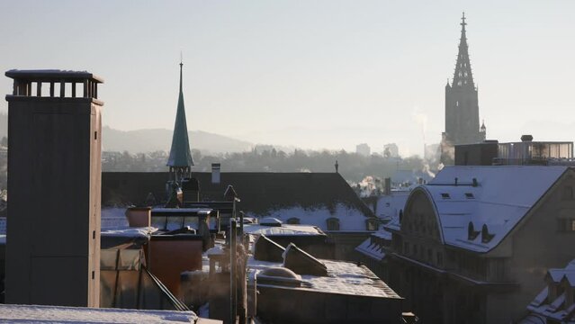 Bern Swiss city overview with snow covered mountains in the background