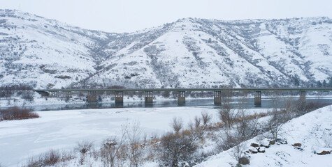 Drone Photograph of highway 95 bridge crossing the Clearwater River south of Lewiston ID on a snowy day in January