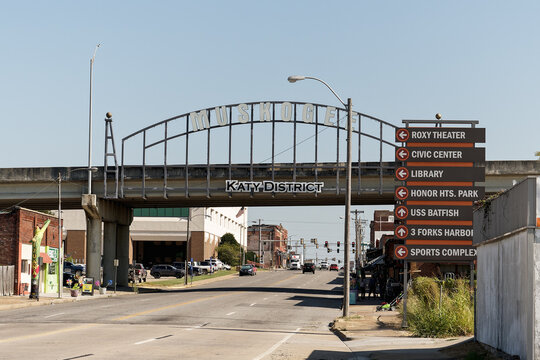 Muskogee, OK - Sept. 16, 2021: Steel signage over the roadway indicates the Katy District of downtown Muskogee.