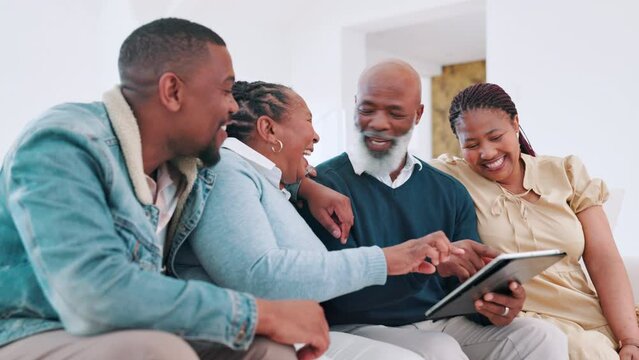 Tablet, happy and black family on sofa in living room of home together for bonding or visit. Smile, man and woman with senior parents talking in apartment for social media browsing on technology