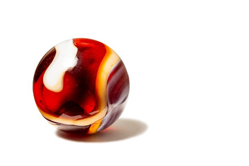 A Red, White, and Orange Swirl Glass Marble