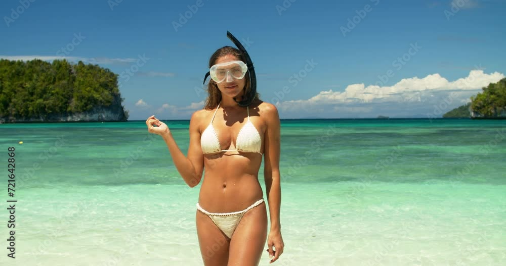 Wall mural Snorkeling, summer beach and woman blow kiss for outdoor freedom, wellness and affection. Ocean, sea and scuba diver portrait, bikini swimsuit and flirt on Costa Rica holiday, travel trip or vacation