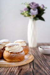 Semla or vastlakukkel is a traditional sweet roll with whipped cream made in Scandinavic, Baltic...