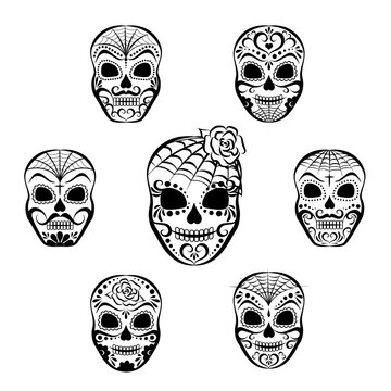 A set of black skulls without background. Dia de los muertos - Day of the Dead.