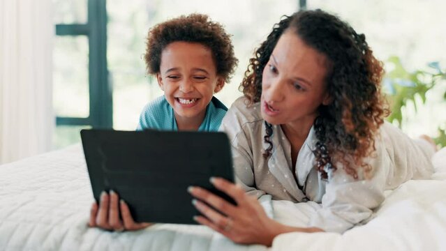 Tablet, selfie and mother and son on a bed with crazy, expression or tongue out gesture in their home. Love, family and African mom with kid in a bedroom for digital, photography and profile picture