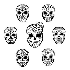A set of black and white skulls without background. Dia de los muertos - Day of the Dead.