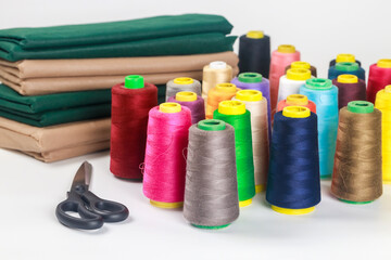 Colored thread spools for a sewing machine.