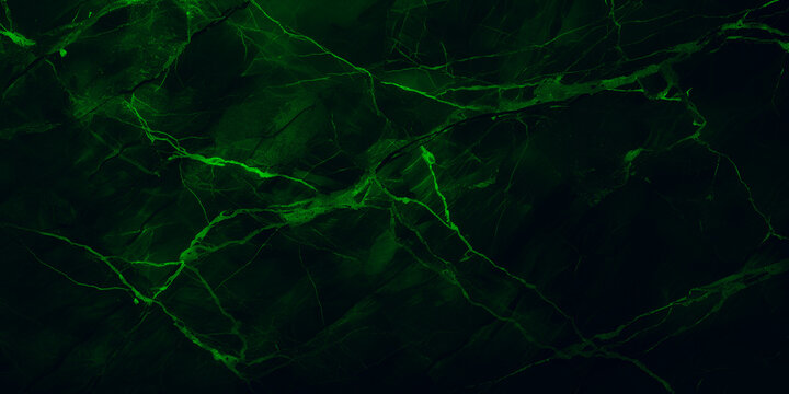Wide panoramic surface of green marble abstract stone texture with neon veins dark tone. For banner, background design