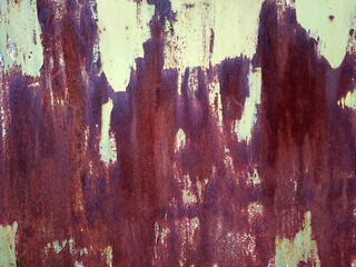 Rusty metal background with streaks of rust. Corroded metal background. Rust stains. Rusty...