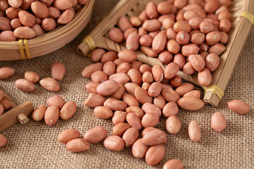 peeled raw peanut kernel on table.