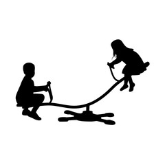 Little boy and little girl on a seesaw, happy girl and boy kids swinging on seesaw together silhouette