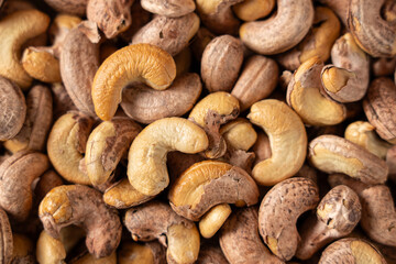 roasted salted cashew nuts texture background.