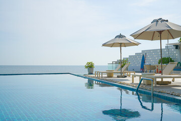 bed pool around swimming pool with sea background