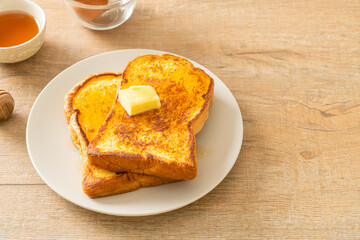 French toasted with butter and honey