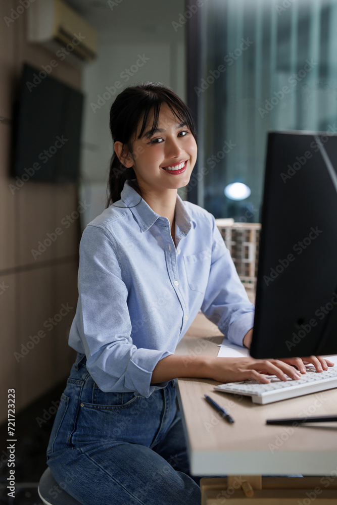 Poster asian architect engineer women typing data and architectural project report on keyboard of computer 