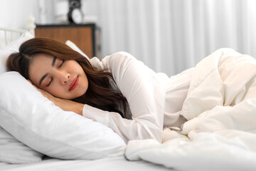 Portrait of cheerful beautiful pretty asian woman clean fresh healthy white skin sleeping and close eye.Girl felling relaxing and enjoy time on the bed at home.asia beauty