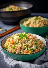 A teal bowl filled with chicken fried rice, asian food, chinese, carbs, protein, food photography, asian influence