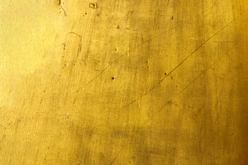 Old gold surface with scratches for background