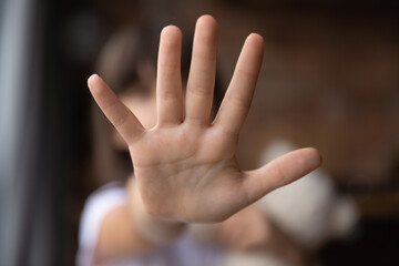 Stop. Blurred shot of little girl stretch hand show no sign mean prepare enough domestic violence...