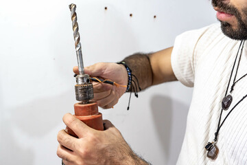 man working with drill