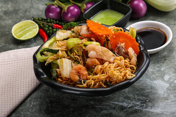 Asian cuisine - Fried noodles with seafood