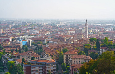 Bergamo, Italy. September 2023. View of the old city from the hill. Landscape in the city center, its historical buildings, churches and towers.