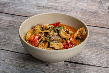 Thai red spicy curry with chicken