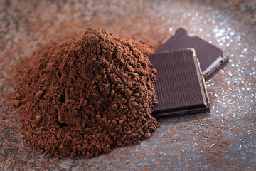Cocoa powder and on a wooden table