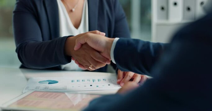 Business people, negotiation and handshake for deal, agreement or partnership in office. Shaking hands, closeup and hiring offer for recruitment, b2b collaboration or data analyst at table in meeting