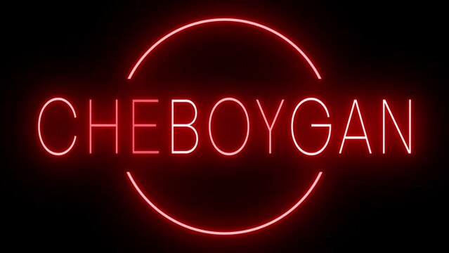 Flickering red retro style neon sign glowing against a black background for CHEBOYGAN