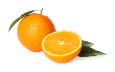 Cut and whole fresh ripe oranges with green leaves on white background